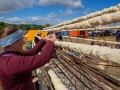 Adele fra Wagando i Taastrup, lægger dej på det 125m lange snobrød som krævede 180kg mel og 14kg gær. Foto: Frank R. Larsen/SPEJDERNE